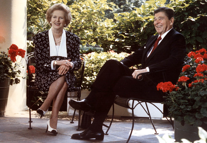 Former US President Ronald Reagan and former British Prime Minister Margaret Thatcher as they pose for photographers on the patio outside the Oval Office, Washington,DC. 