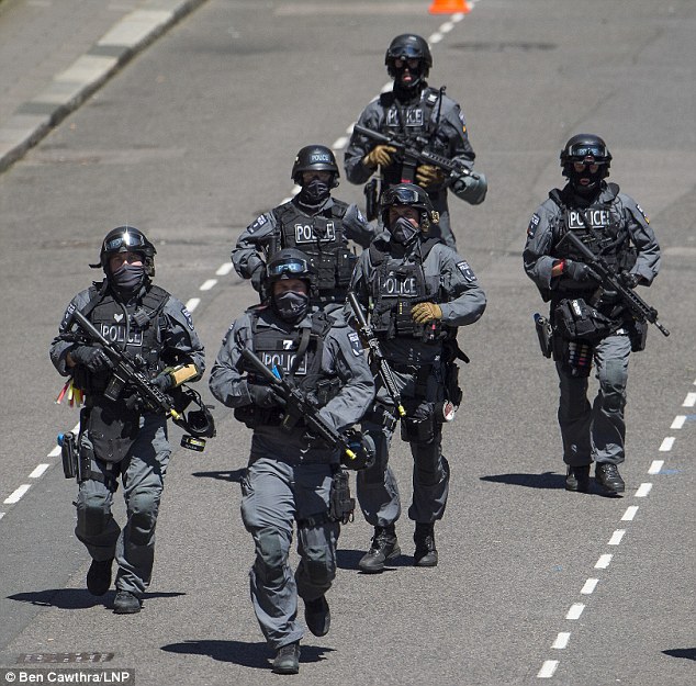 Security is being ramped up ahead of VJ Day celebrations in London next week following the revelation that home-grown jihadis are planning to murder the Queen (file photo of counter-terrorism training exercise)