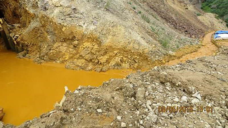 Contaminated wastewater is seen at the entrance to the Gold King Mine in San Juan County, Colo., in this picture released by the Environmental Protection Agency. The photo was taken Wednesday; the plume of contaminated water has continued to work its way downstream.