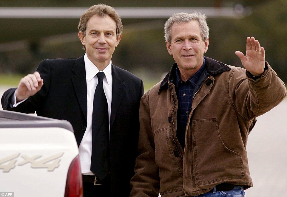 All sewn up: President George Bush and UK prime minister Tony Blair at the infamous 2002 summit at Bush's ranch house in Crawford, Texas, where the two men spoke about invading Iraq