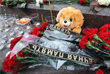 Flowers and candles at the monument to the border guards of the Fatherland on the area Yauza Gate in Moscow in memory of the victims of the air crash