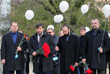 Deputy Chairman of National Council of the People's Republic of Donetsk Pushilin Denis (second from left) lays flowers in memory of the dead passengers of the flight Sharm el-Sheikh - Saint Petersburg