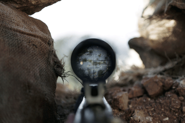 The view through the scope of a weapon that belongs to a member of Ahrar al-Sham, Idlib, Syria, March 2015 © Khalil Ashawi/Reuters