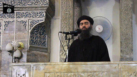 A file image grab taken from a propaganda video released on July 5, 2014 by al-Furqan Media allegedly shows the leader of the Islamic State (IS) jihadist group, Abu Bakr el-Baghdadi, aka Caliph Ibrahim. © Al-Furqan Media