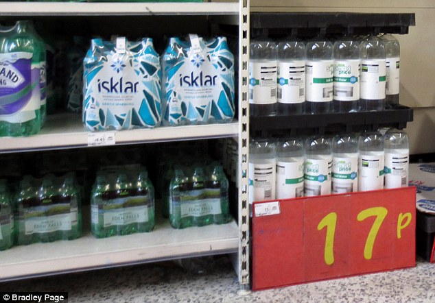 Display: Asda's 17p Still Water next to other, more well-known, mineral waters