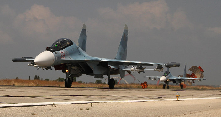 Russian Su-30 jets landing at the Hmeymim airbase, Syria