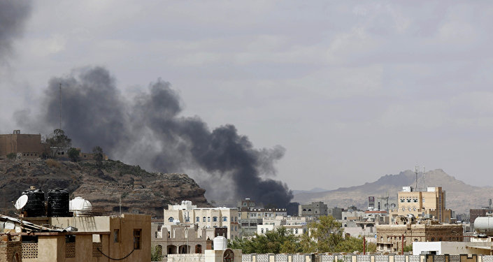 Smoke rises after a Saudi-led airstrike hit a site in Yemen