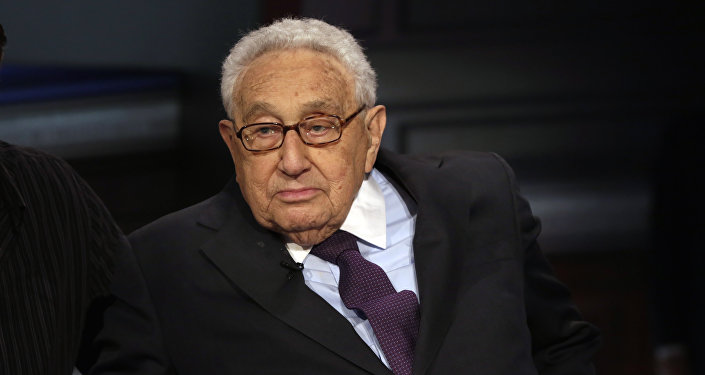 Former U.S. Secretary of State Henry Kissinger is interviewed by Neil Cavuto on his Cavuto Coast to Coast program, on the Fox Business Network, in New York, Friday, June 5, 2015
