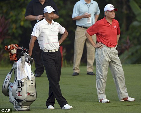 High circles: Tiger played with Malaysian Prime Minister Najib Razak during the pro-am ahead of this week's CIMB Classic in Kuala Lumpur