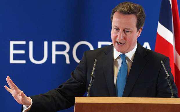 British Prime Minister David Cameron speaks during a media conference after an EU Summit in Brussels