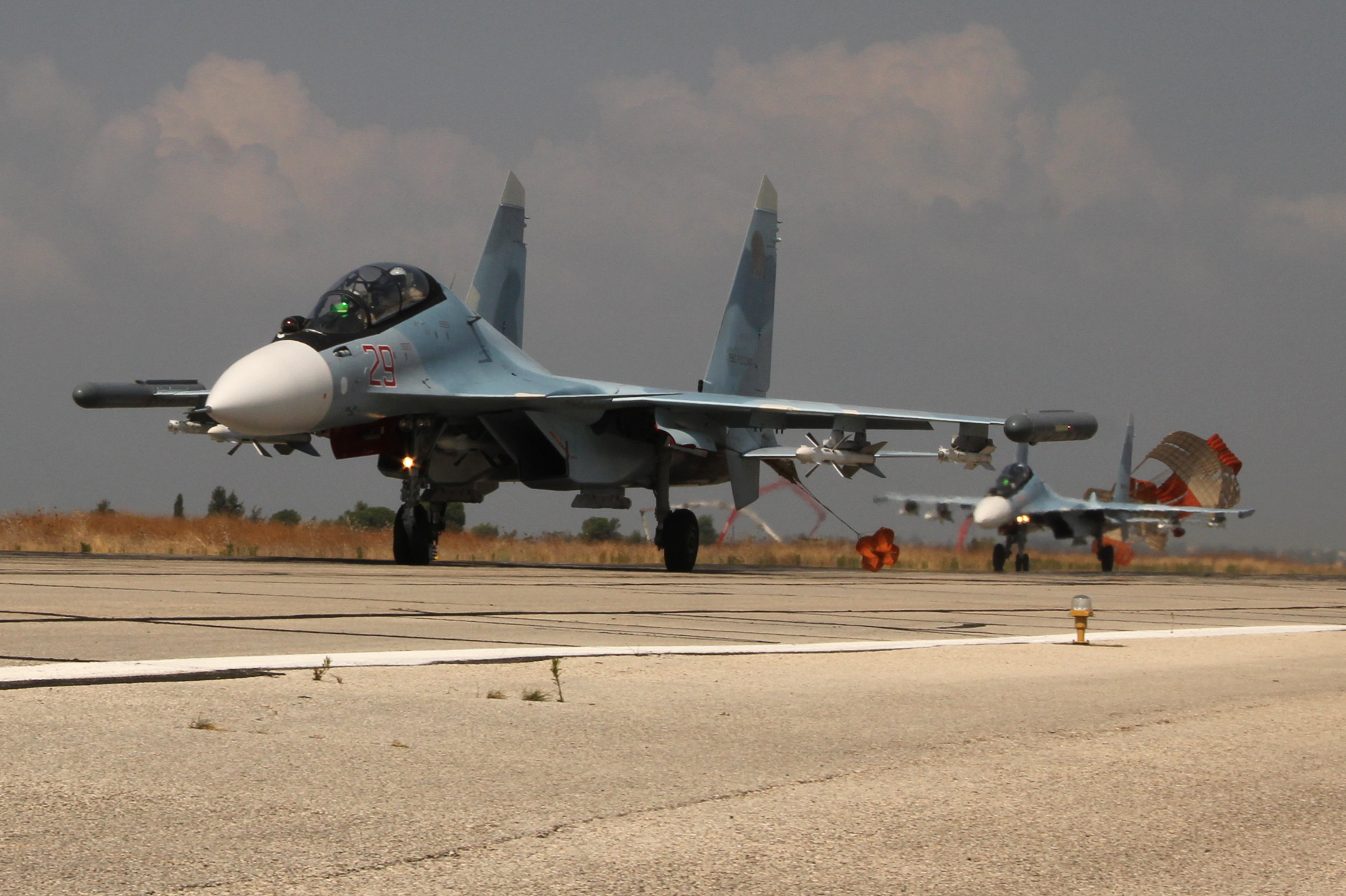 Russian Su-30 jets landing at the Hmeymim Air Base.