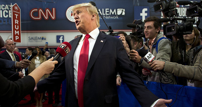 Republican presidential candidate businessman Donald Trump speaks with the media in the Spin Room following the Republican Presidential Debate, hosted by CNN, at The Venetian Las Vegas on December 15, 2015 in Las Vegas, Nevada