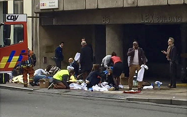 Treating the injured outside a Brussels Metro station