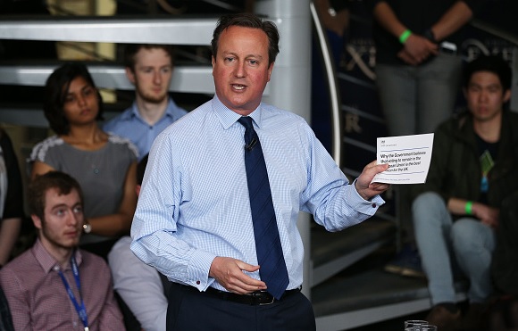 Cameron holds pro-EU leaflet