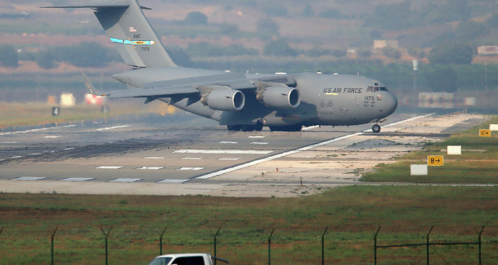 A United States Air Force cargo plane maneuvers on the runway after it landed at the Incirlik Air Base, on the outskirts of the city of Adana, southern Turkey, Friday, July 31, 2015