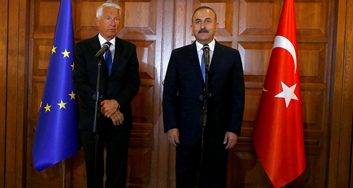 Turkey's Foreign Minister Mevlut Cavusoglu (R) and Secretary General of the Council of Europe Thorbjorn Jagland address the media in Ankara, Turkey, August 3, 2016.