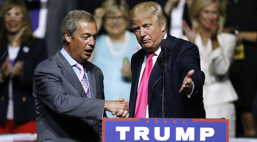 Republican Presidential nominee Donald Trump, right, invites United Kingdom Independence Party leader Nigel Farage to speak during a campaign rally at the Mississippi Coliseum on August 24, 2016 in Jackson, Mississippi. © Jonathan Bachman 