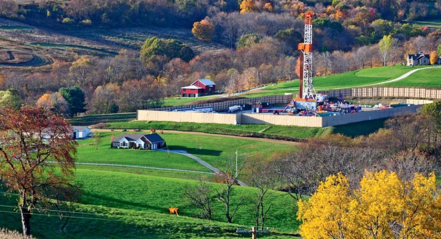A natural gas rig side by side with homes in Washington County, Pennsylvania.B. Mark Schmerling