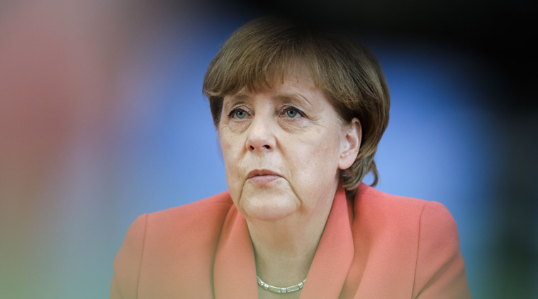 Angela Merkel, Germany india relation, stable predictable tax regime, retrospective taxation, Indian express, business news