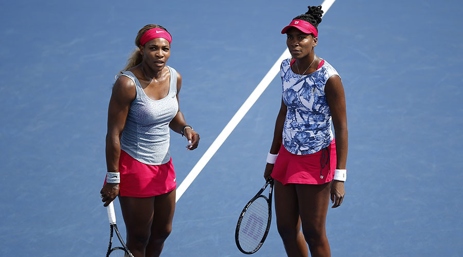 Serena Williams (L) and Venus Williams. © Eduardo Munoz