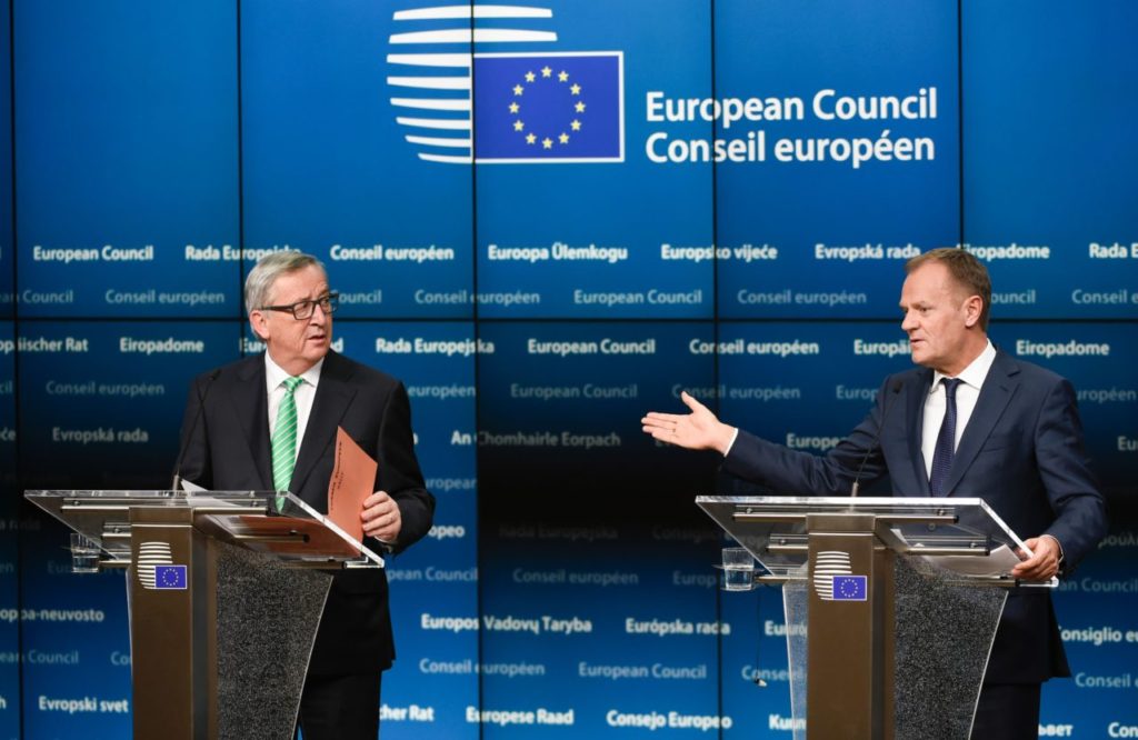 European Commission President Jean-Claude Juncker (L) and President of Council Donald Tusk give a joint press during an European Summit at the EU Headquarters in Brussels on February 20, 2016. The deal, sealed after hours of haggling at a marathon summit, paves the way for a referendum on whether Britain will stay in the EU. The European Union's two top figures, Donald Tusk and Jean-Claude Juncker, presented its 28 leaders with draft proposals at a long-delayed dinner after hours of painstaking face-to-face talks on an issue that threatened place in the union. / AFP / JOHN THYS (Photo credit should read JOHN THYS/AFP/Getty Images)