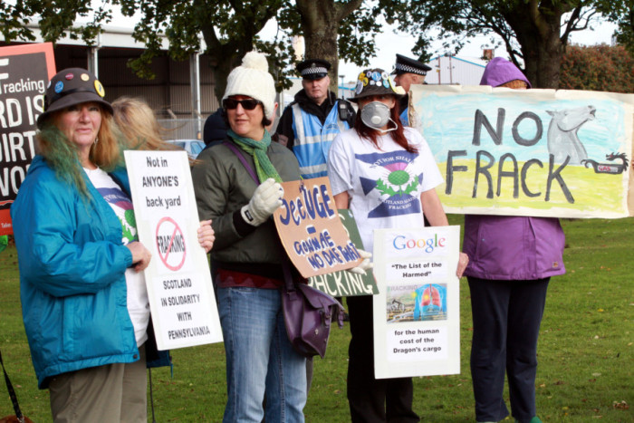 Protesters outside Grangemouth oil refinary on the day when the Ineos Insight gas carrier arrives at Grangemouth