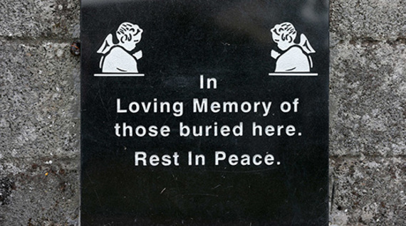 Chilling words of the plaque errected outside the burial ground at Tuam.