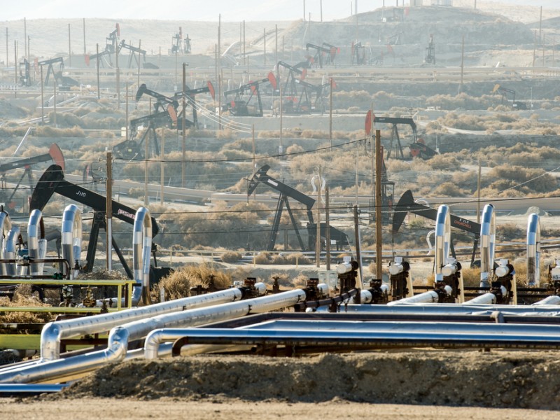 pumpjacks extract oil from an oilfield in Kern County, Calif.