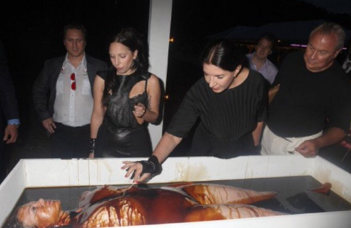 Lady Gaga with Marina in one of her trademark events involving pretend cannibalism.