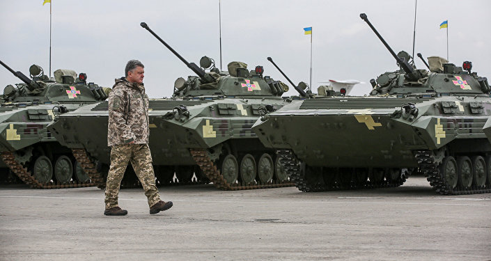 Ukrainian President Petro Poroshenko attends a ceremony to hand over weapons and military vehicles to servicemen of the Ukrainian armed forces in Chuhuiv outside Kharkiv, Ukraine, October 15, 2016