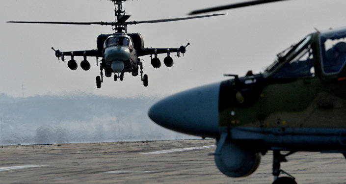 Ka-52 Alligator helicopters during tactical flight training. (File)
