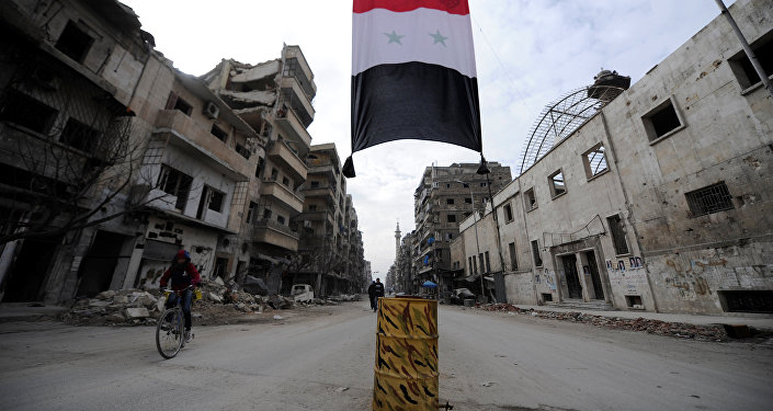 A Syrian national flag hangs in a damaged neighbourhood in Aleppo, Syria January 30, 2017