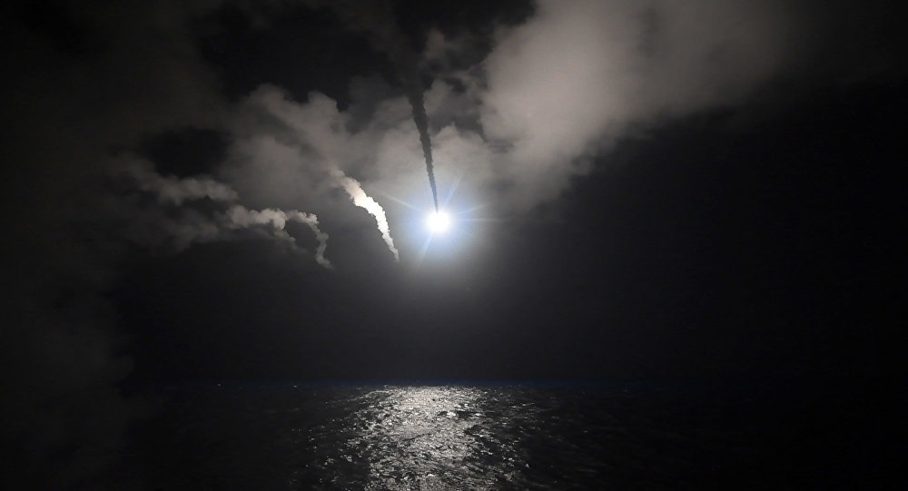 In this image provided by the U.S. Navy, the guided-missile destroyer USS Porter (DDG 78) launches a tomahawk land attack missile in the Mediterranean Sea, Friday, April 7, 2017.