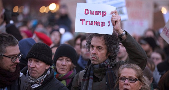 People protest against US President-elect Donald Trump in Berlin, Germany, November 12, 2016.