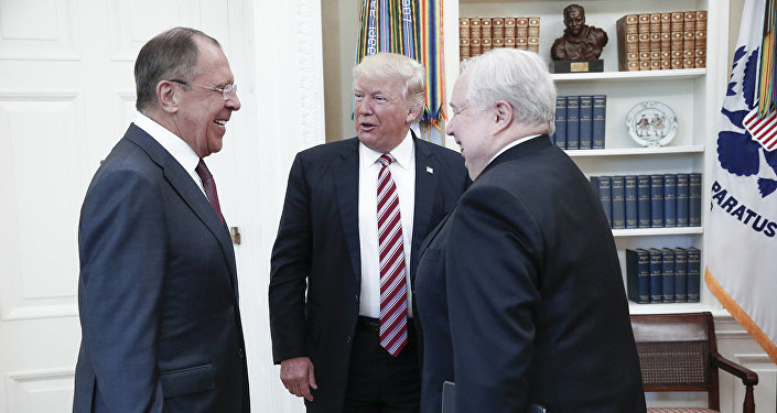 A handout photo made available by the Russian Foreign Ministry on May 10, 2017 shows US President Donald J. Trump (C) speaking with Russian Foreign Minister Sergei Lavrov (L) and Russian Ambassador to the U.S. Sergei Kislyak during a meeting at the White House in Washington, DC