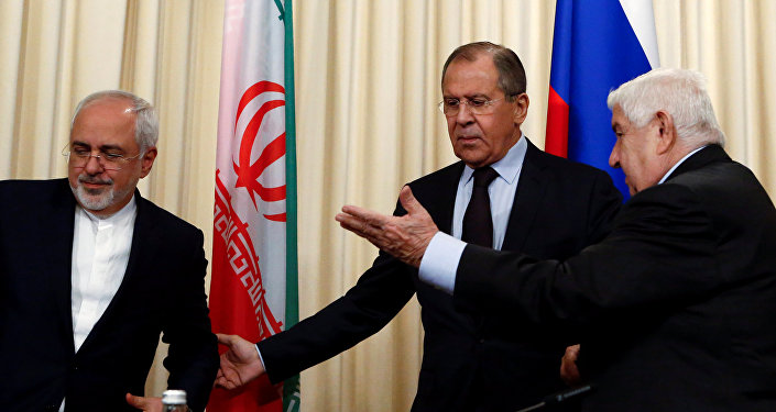 Russian Foreign Minister Sergei Lavrov (C) and his counterparts Walid al-Muallem (R) from Syria and Mohammad Javad Zarif from Iran attend a news conference in Moscow, Russia, October 28, 2016.