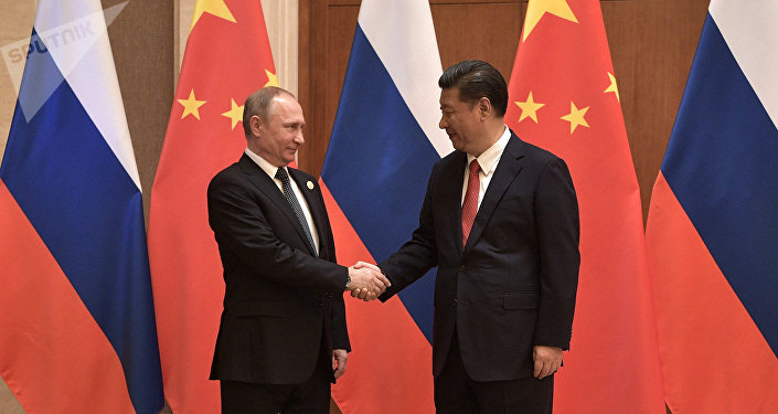 President Vladimir Putin and President of China Xi Jinping, right, during the Russia-China talks at the One Belt, One Road international forum