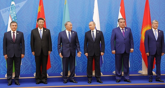 June 9, 2017. President Vladimir Putin poses for photographs with the participants of the meeting of the Council of Heads of State of the Shanghai Cooperation Organization (SCO). From left: President of Uzbekistan Shavkat Mirziyoyev, President of China Xi Jinping, President of Kazakhstan Nursultan Nazarbayev. From right: President of Kyrgyzstan Almazbek Atambayev, President of Tajikistan Emomali Rahmon.