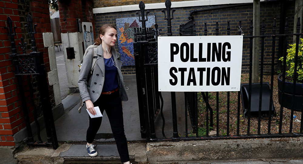 A voter arrives at a polling station in London, Britain June 8, 2017.