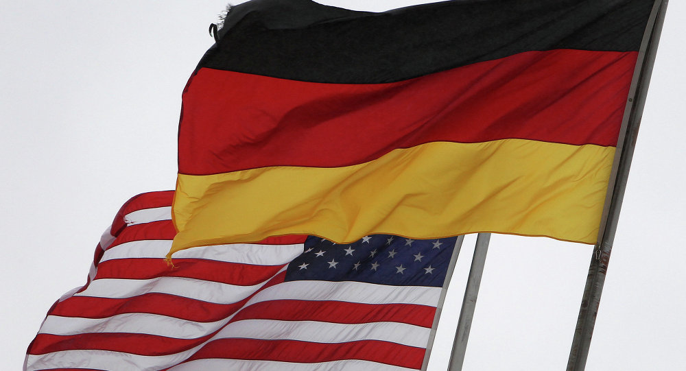 The German and the US flags fly at the US Airbase in Ramstein, southern Germany, on November 6, 2013