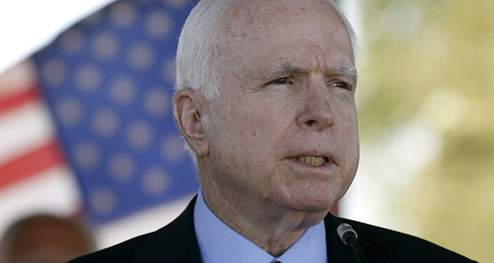In this May 30, 2016, photo, Sen. John McCain, R-Ariz, speaks during a Phoenix Memorial Day Ceremony at the National Memorial Cemetery of Arizona in Phoenix.