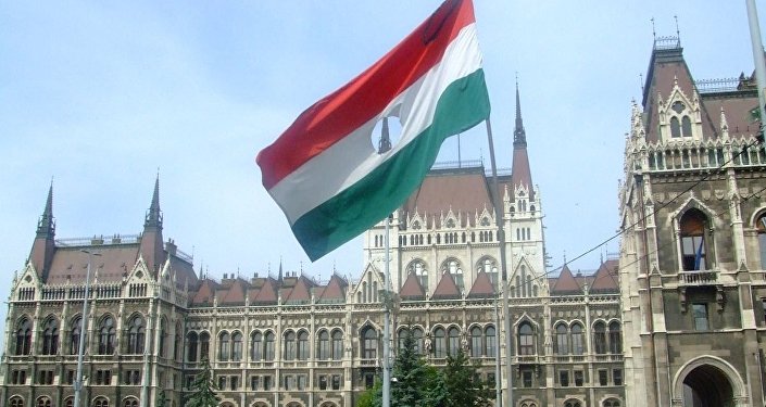 A flag from the 1956 Hungarian Revolution on the memorial to the victims located outside the Hungarian Parliament Building
