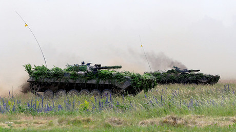 FILE PHOTO Poland's army tanks attend the final day of NATO Saber Strike exercises in Orzysz, Poland © Ints Kalnins