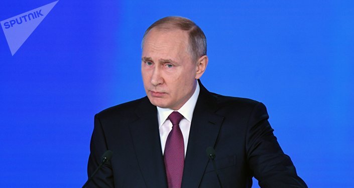 Russian President Vladimir Putin delivers his annual Presidential Address to the Federal Assembly at the Manezh Central Exhibition Hall