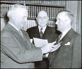 William Stephenson is honored for his wartime service with the US “Medal of Merit,” presented by William Donovan at a ceremony in 1946